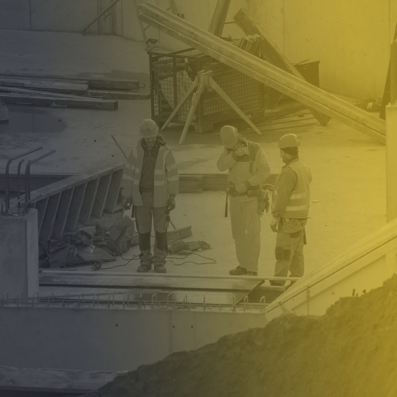 Construction workers discussing a project on site